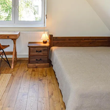 Dom W Sadzie بيت للعطل مورونغ